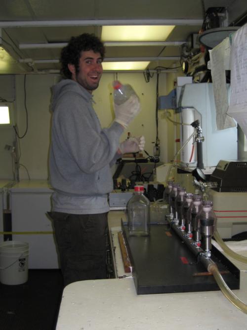 Graduate Student Peter Kahn at the Primary Production station